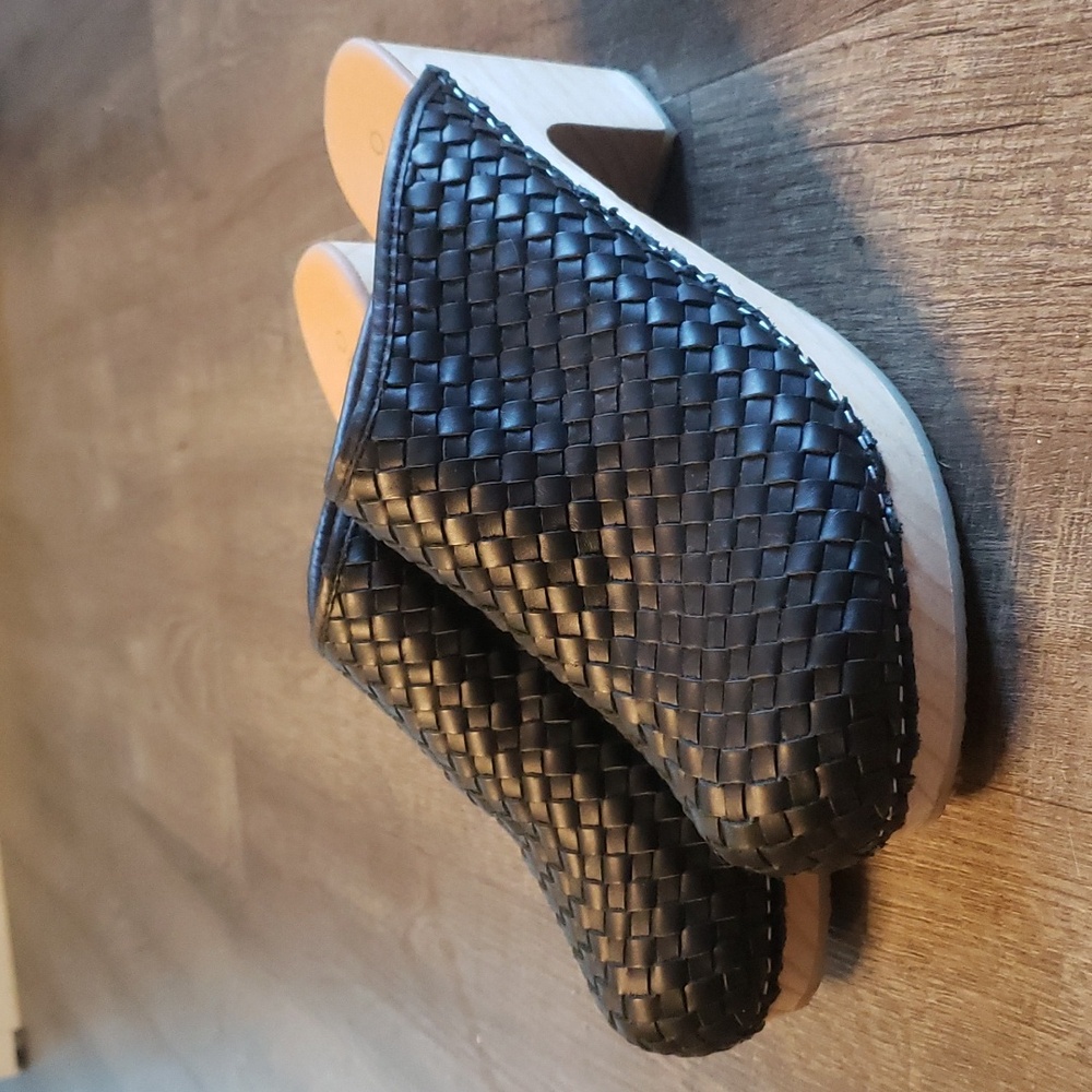 Black woven clogs